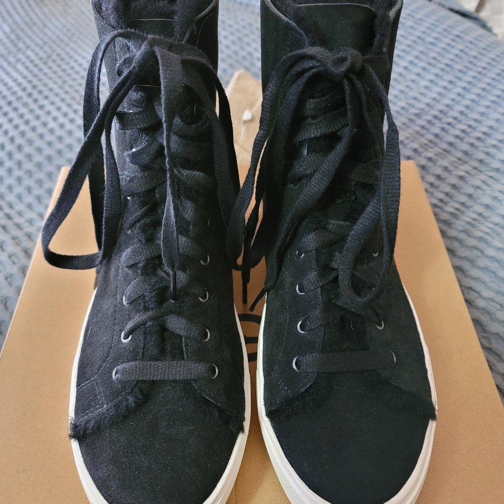 Ugg black, fur lined high top tennis shoes size 9